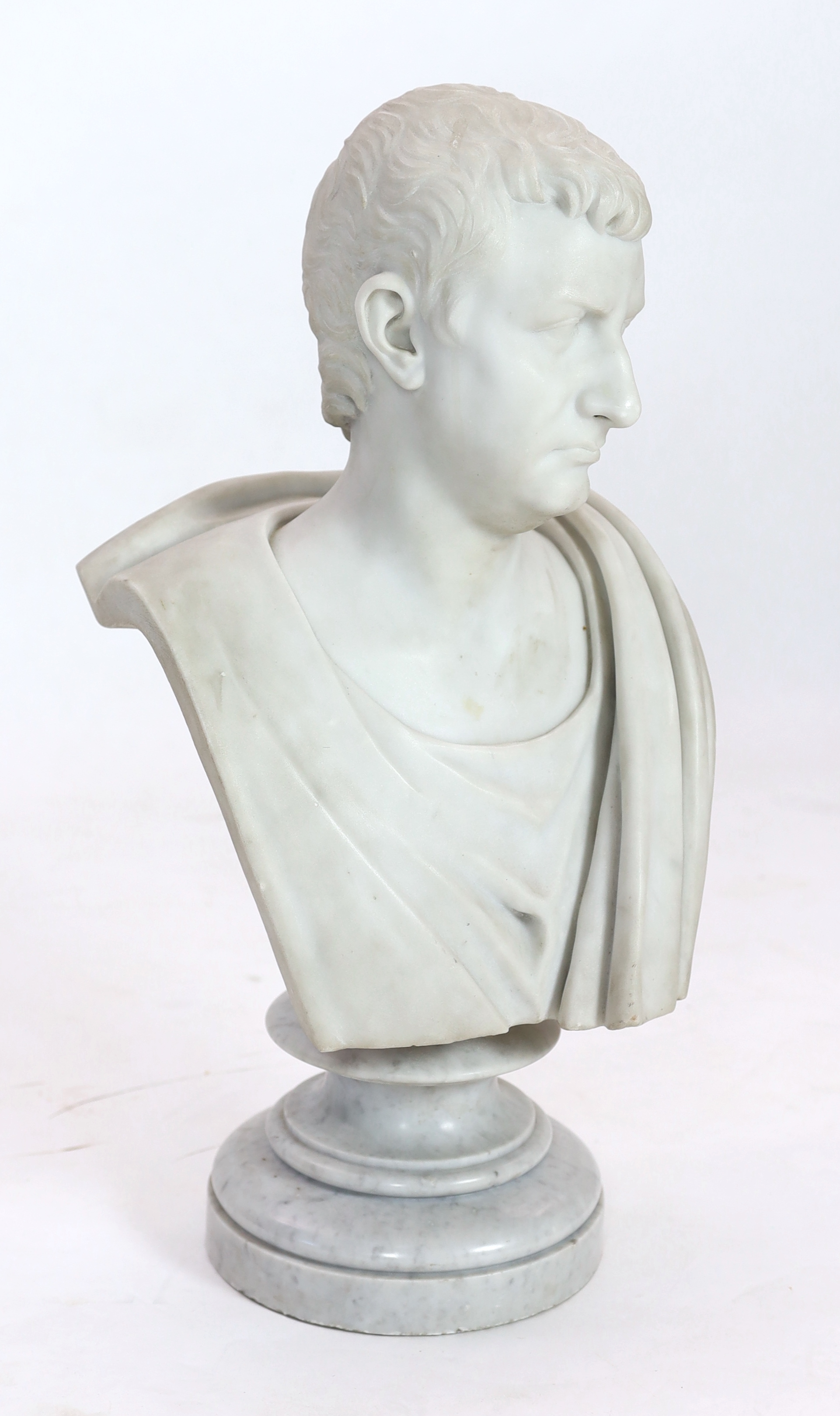 Studio of Orazio Andreioni (c.1840-1895), a 19th century Italian white marble bust of a Roman Emperor, possibly Tiberius, 41cm wide, 30cm deep, overall 75cm high, Please note this lot attracts an additional import tax of